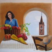 Dipinto di Fiorenzo Isaia raffigurante una donna sorridente al tavolo con un cesto di peperoni colorati e una finestra aperta su un campanile.