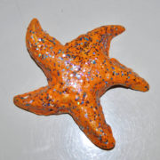 Roberto Consiglieri, Stellina, stella marina in ceramica decorata con brillantini e perline.