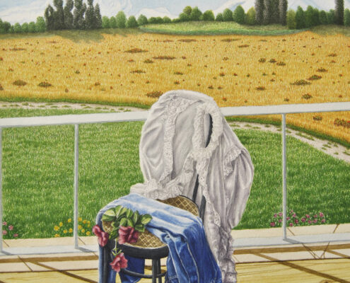 Oggetti su una sedia davanti a un campo dorato e montagne, simbolo di crescita e passaggio verso la vita.