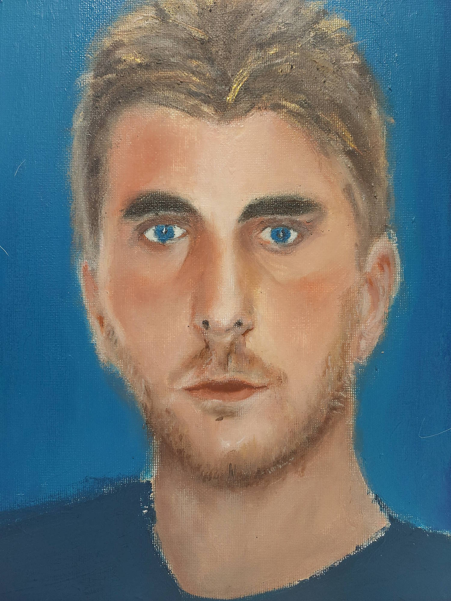 Dipinto espressionista figurativo di Antonio Andreozzi intitolato Il biondo suicida, raffigurante il primo piano di un giovane uomo biondo con occhi azzurri e uno sguardo malinconico su uno sfondo blu cobalto uniforme.